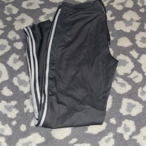 Grey adidas joggers.